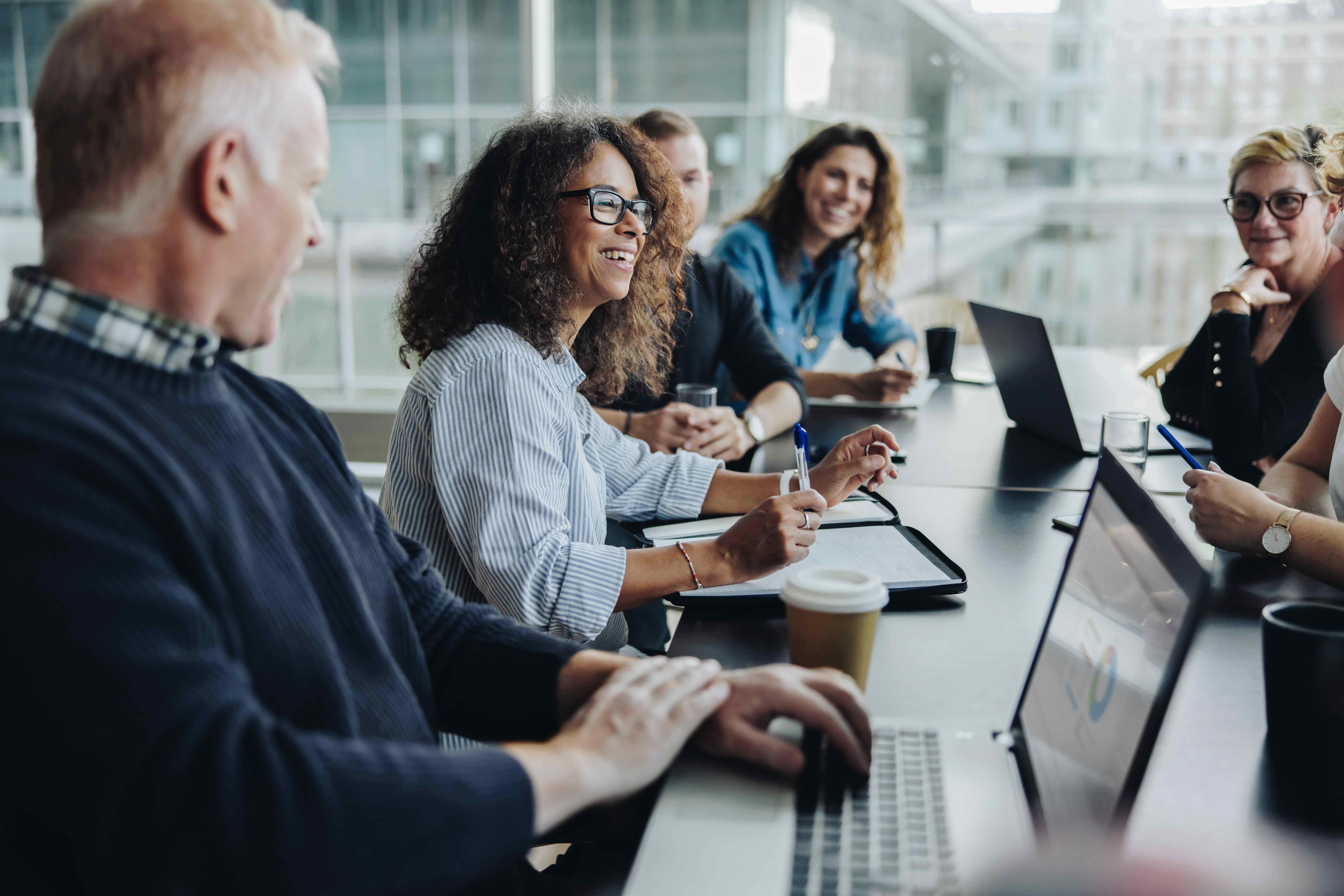 Diverse team collaborating in a bright meeting room